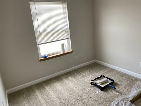 Matching aluminum blinds in an empty Pineview rental unit