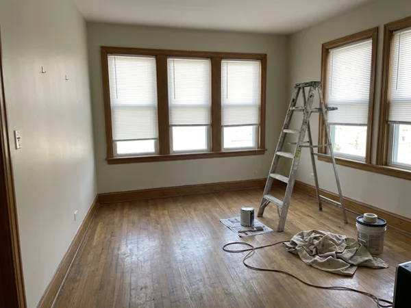 Matching vinyl blinds in an empty Orleans duplex unit