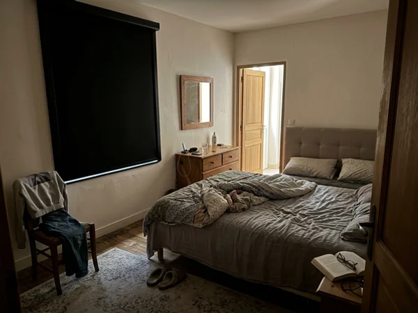 Orleans master bedroom with a blackout roller blind in side channels