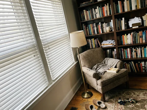 White painted 2.5-inch basswood blinds in a Westboro den