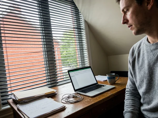 Charcoal 2-inch aluminum blinds in a Glebe home office